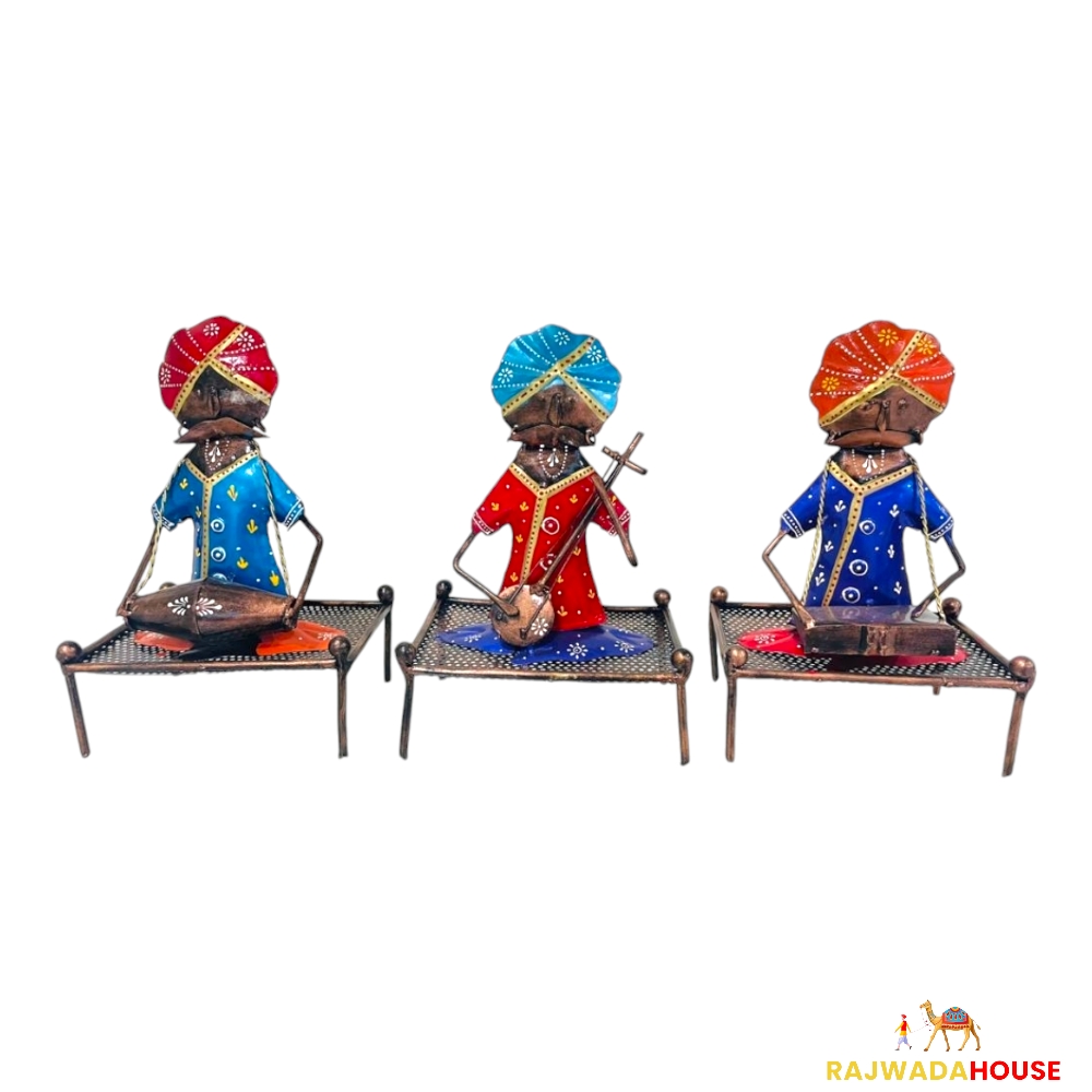 Ethnic Rajasthani Musician Sitting On Chaarpai